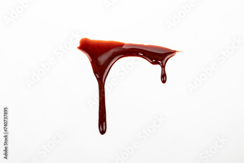 A blood spatter. A blood flowing down. Bloody pattern. Concepts of blood can be used in design