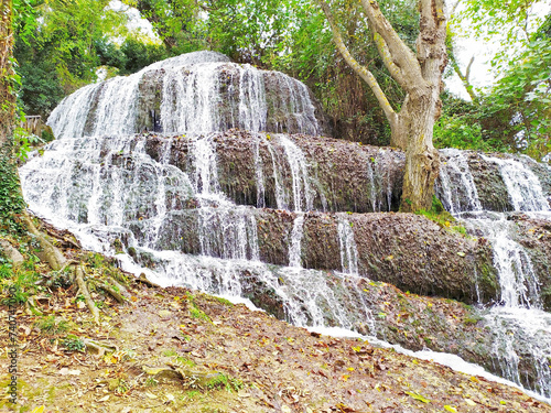 Breathtaking waterfall in the woods.