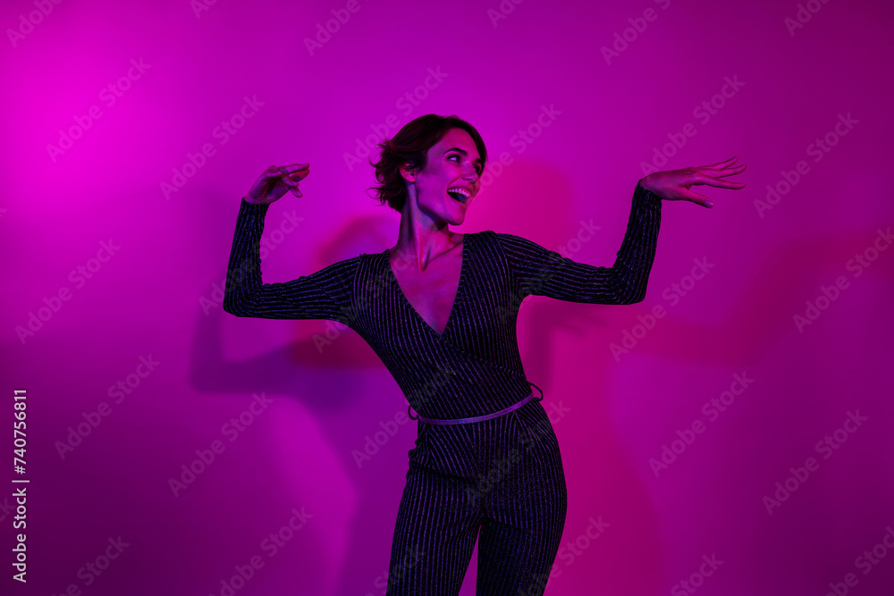 Naklejka premium Photo portrait of pretty young girl dancing enjoy discotheque dressed stylish overall outfit isolated on neon light pink color background