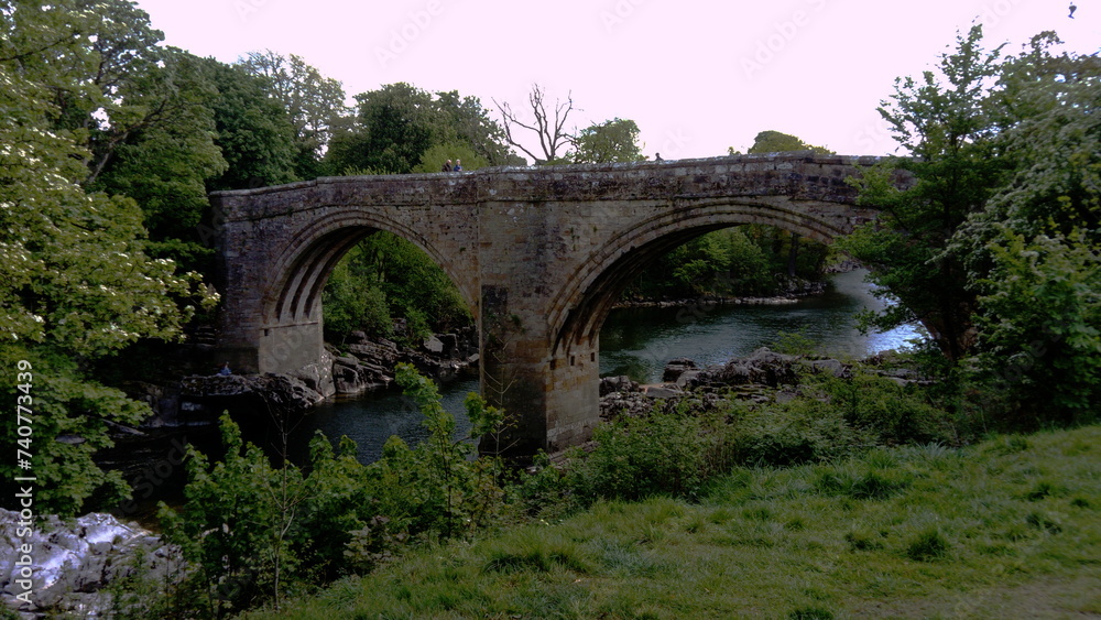 The River Lune and Devil's Bridge at Kirby Lonsdale in Cumbria, UK. Built in 12th or 13th century, iIt is a popular meeting place for motorcyclists