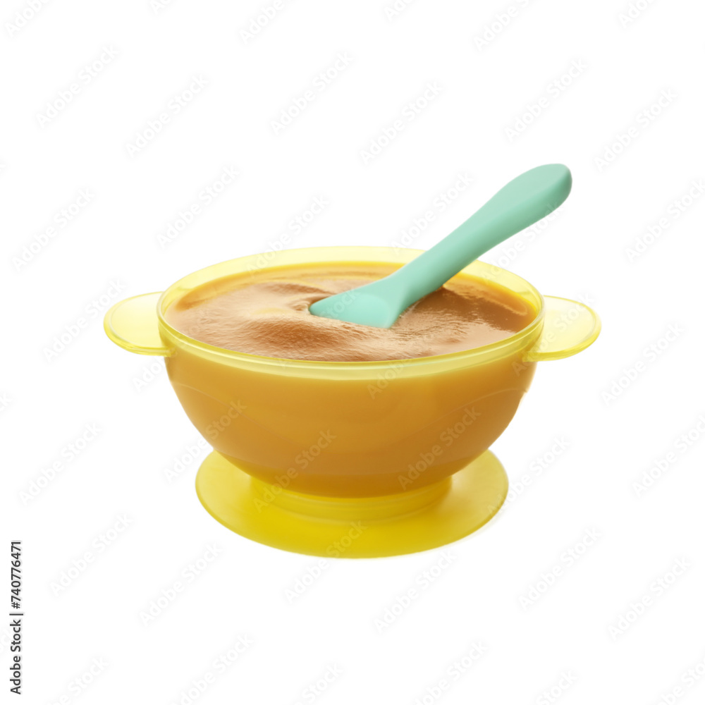 Tasty baby food and spoon in bowl isolated on white Tasty baby food and spoon in bowl isolated on white