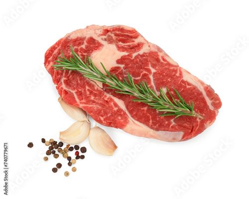 Raw beef steak and spices isolated on white, top view