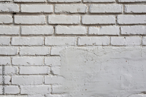 white brick wall © Alessandro