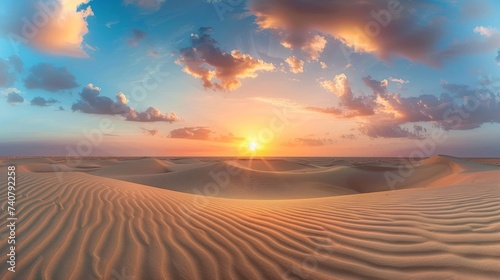 Sunset over the desert of Al Khatim in Abu Dhabi, Emirates. Golden Sand Dune Desert Landscape Panorama. Beautiful sunset over the sand dunes in the Al Khatim in Abu Dhabi,