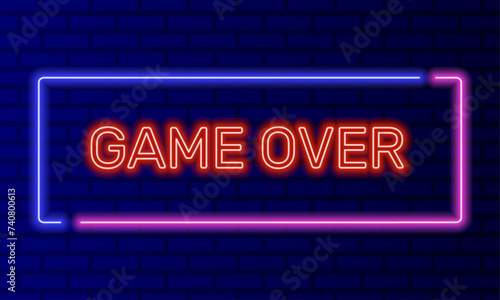 Neon sign game over in speech bubble frame on brick wall background vector. Light banner on the wall background. Game over button finish waste lose, design template, night neon signboard