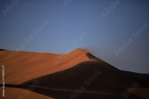 a windy day to climb the  big daddy  sand dune in Sossusvlei  Namibia