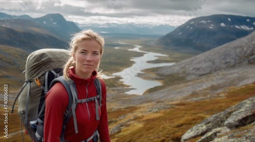 Female hiker enjoying the landscape of the Laugavegur hiking trail near Alftavatn photo