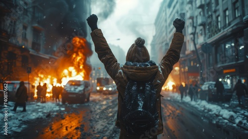 A chaotic and intense moment unfolds in the city streets as a massive crowd of rioters and protesters engage in destructive acts, setting fires and causing chaos, escalating tensions dangerously. photo