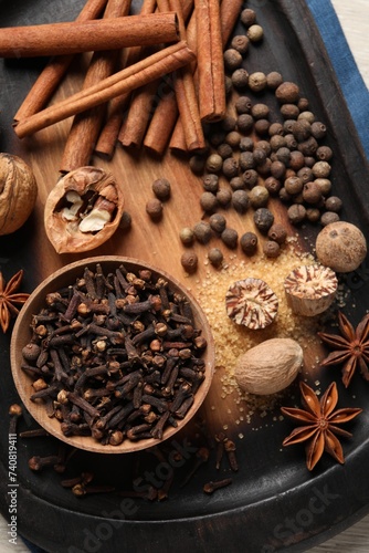 Different aromatic spices on table, top view