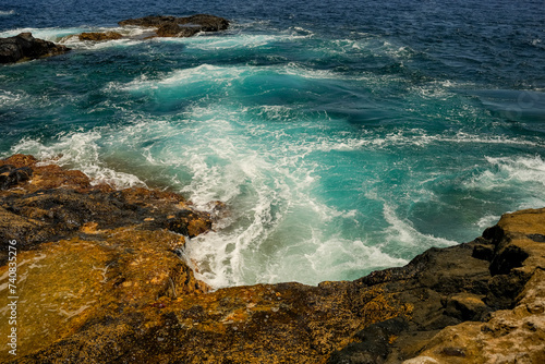 Beautiful rocks and turquoise sea on the coast of the Canary Islands, Tenerife Spain. 