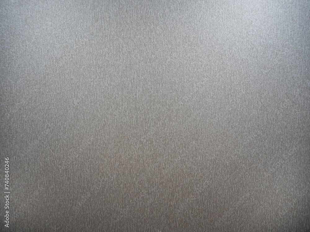 imagen detalle textura plafón de pared de un ascensor, de color gris con lineas de distintos colores 