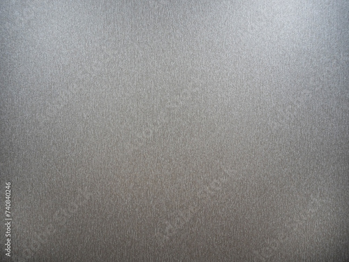 imagen detalle textura plafón de pared de un ascensor, de color gris con lineas de distintos colores 