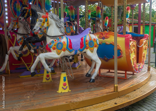 Colorful carousel in atraction park . photo