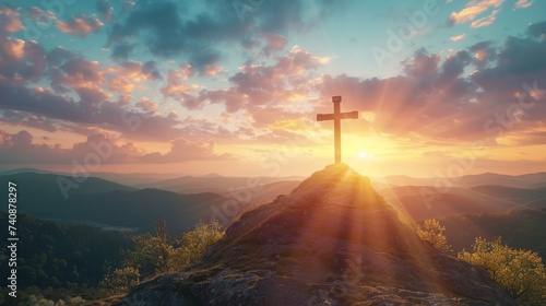 A sunset sky background with the crucifix symbol of Jesus photo