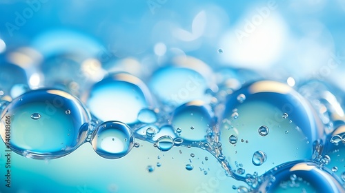 Macro of oil and water bubbles creating a scientific image of cell and cell membrane with blue gradient background.
