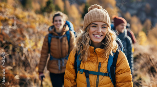 A group of friends hiking together in the mountains © Nuchylee