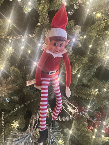 child playing with christmas tree