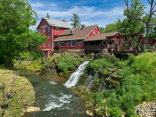 Historic Clifton Mill is one of the largest water powered grist mills in the world. This historical landmark is located in Clifton Ohio USA. Featuring a waterfall, covered bridge, and restaurant