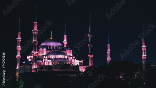 Sultan Ahmed or Blue Mosque at night time with purple lighting. Istanbul, Turkey
