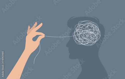 Hand untangling a tangle of thoughts in a man's head. The concept of psychological help and support. Flat vector illustration