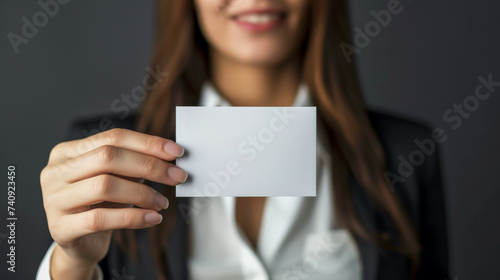 business woman holding blank card © WettE