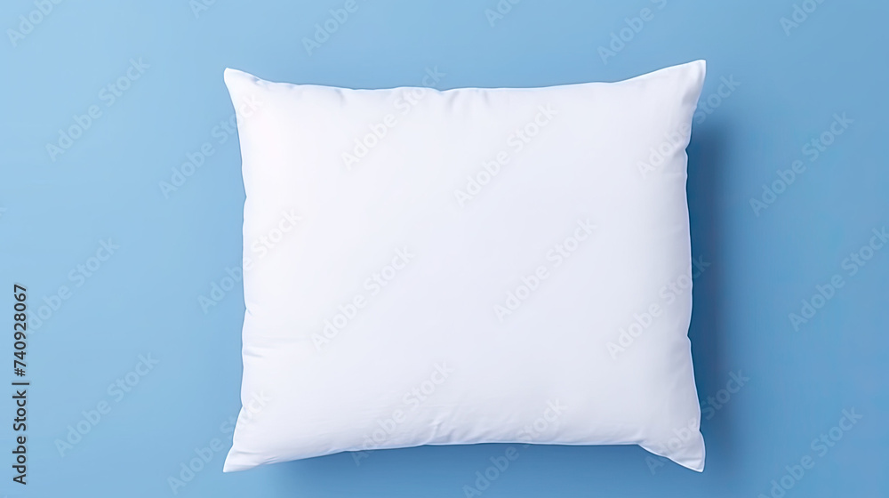 White Soft Pillow isolated on blue background White Soft Pillow isolated on blue background