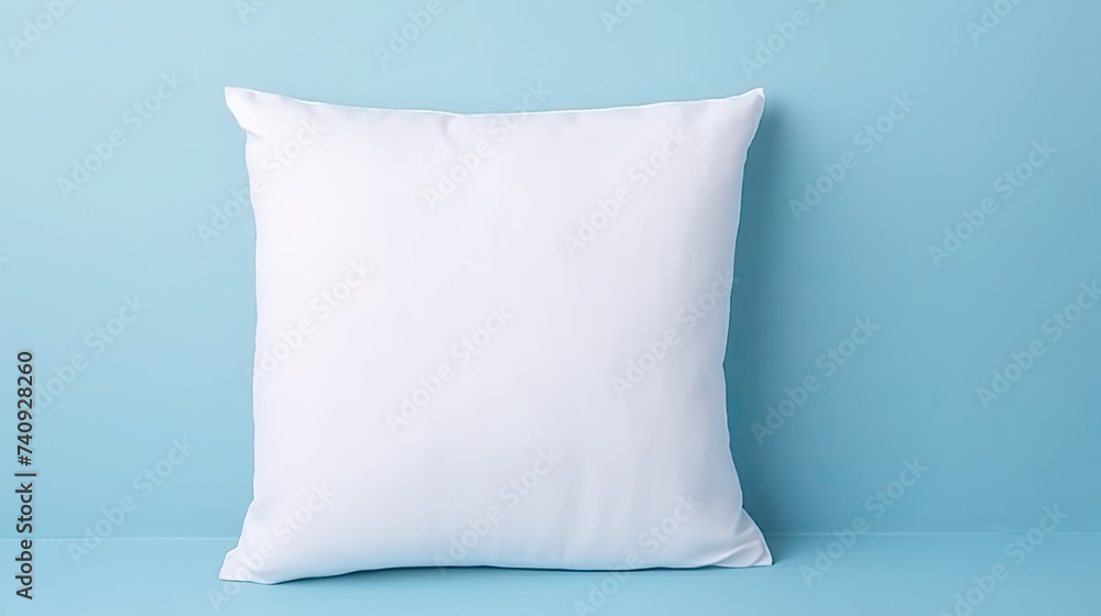 White Soft Pillow isolated on blue background White Soft Pillow isolated on blue background