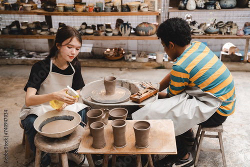 handcraft artist person using art skill of creativity to making ceramic clay craft pottery workshop by hand finger, wet and dirty work with mud for shape bowl traditional in hobby or manufacturing