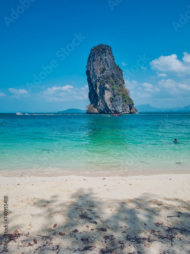 Koh Poda beach with turqouise waters and a limestone cliff in front, part of 4 islands tour, Krabi, Thailand