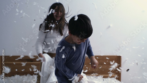 Carefree Childhood - Kids in Feather-Filled Pillow Battle, Captured at 1000 FPS