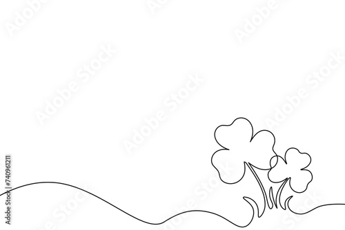 Continuous handdrawing line with clover outline isolated on transparent background. Happy St. Patrick's Day banner. Black line vector illustration photo