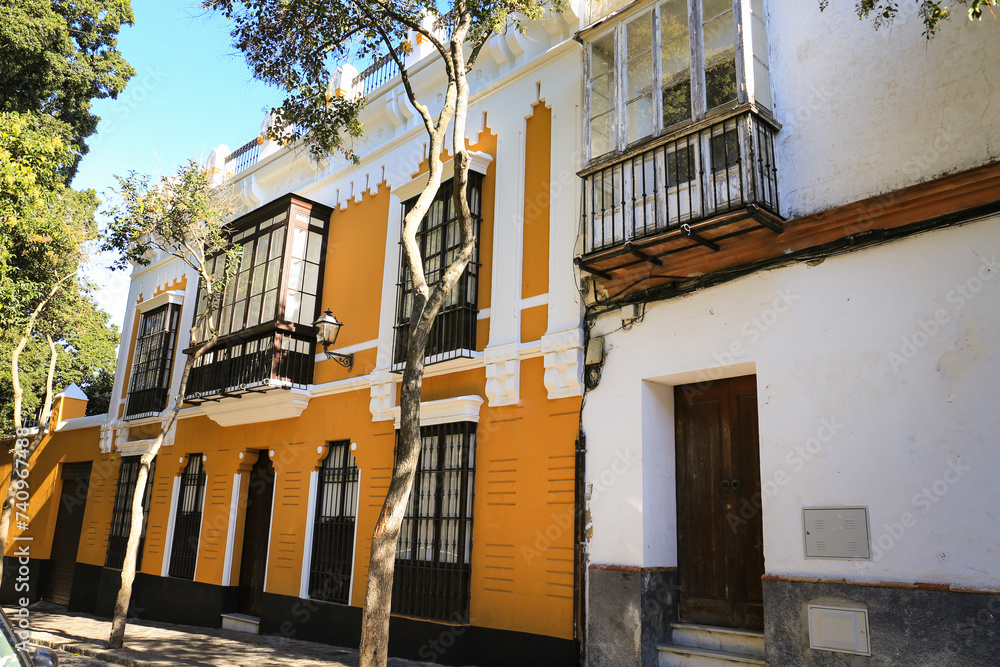 Narrow street and beautiful facades in Sanlucar de Barrameda, Cadiz