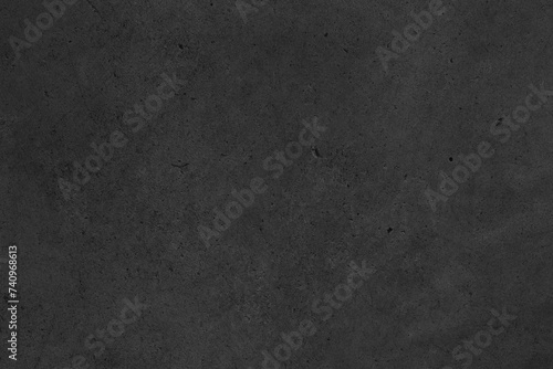 Dark grey textured concrete background