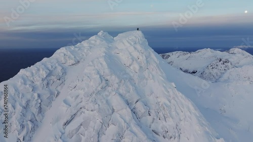 Wallpaper Mural Explore the Cold Embrace of the Alps, Where Mountain Peaks Rise Like Icy Monoliths Against the Sky, a True Winter Wonderland. Torontodigital.ca