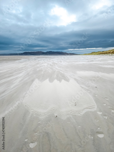 Sand storm forming a tulip at Dooey beach by Lettermacaward in County Donegal - Ireland photo