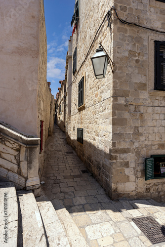View of picturesque narrow street next baroque Jesuit Stairs  Dubrovnik  Croatia