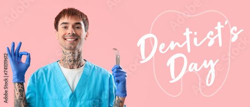 Male dentist with tools sho...