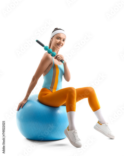 Sporty young woman with fit...