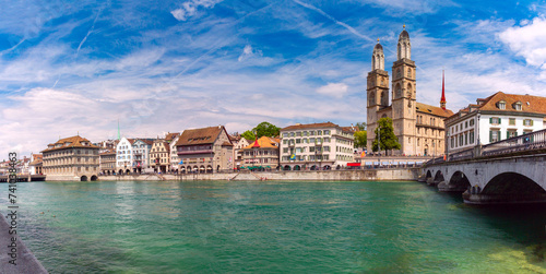Famous Grossmunster churche and river Limmat in Old Town of Zurich, Switzerland photo