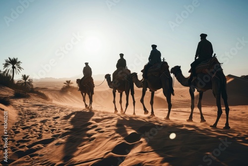 Silhouette people riding camels in desert native tuareg arabic african person Sahara wildlife tourist attraction Dubai arab tour sunset caravan adventure long journey tour dune sun Bible story Quran
