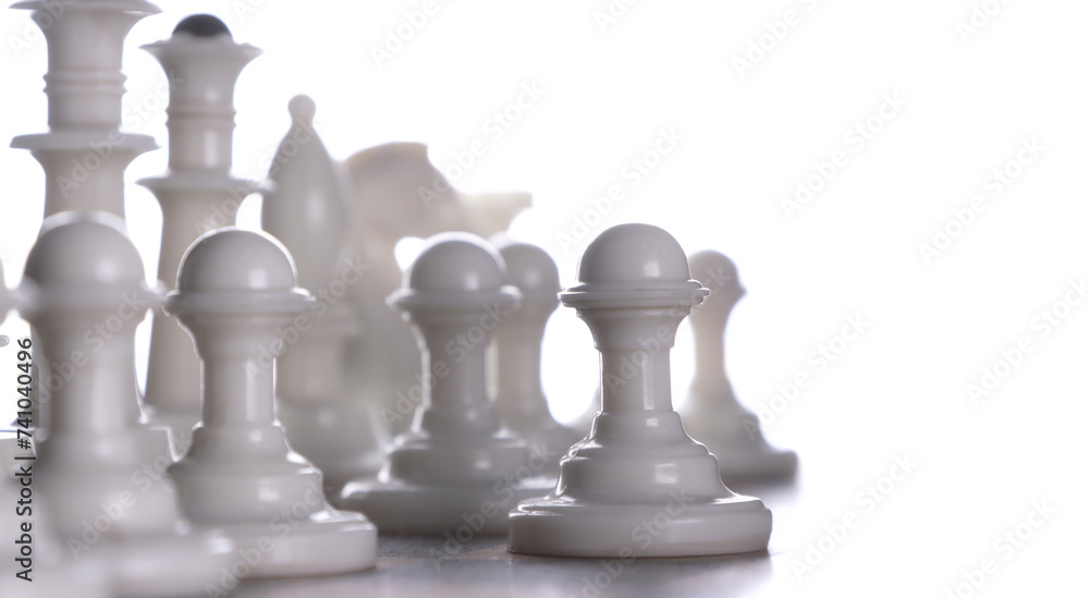 Close-up. White chess pieces on a chessboard. Light background. Close-up. White chess pieces on a chessboard. Light background.