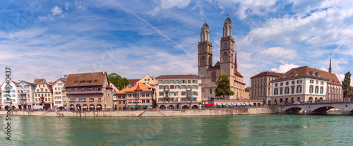 Famous Grossmunster churche and river Limmat in Old Town of Zurich, Switzerland photo