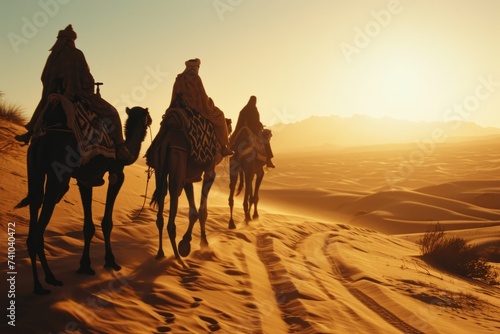 Silhouette people riding camels in desert native tuareg arabic african person Sahara wildlife tourist attraction Dubai arab tour sunset caravan adventure long journey tour dune sun Bible story Quran photo