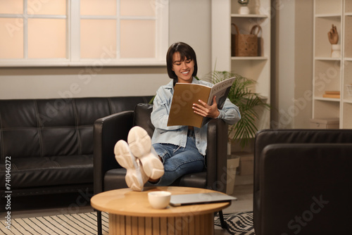 Smiling young woman relaxin...