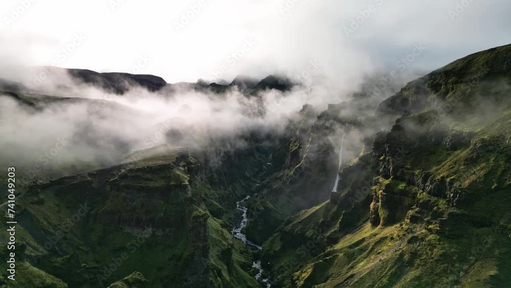 Mulagljufur Canyon with Hangandifoss Waterfall , Iceland. travel destination.aerial landscape footage Mulagljufur Canyon with Hangandifoss Waterfall , Iceland. travel destination.aerial landscape footage