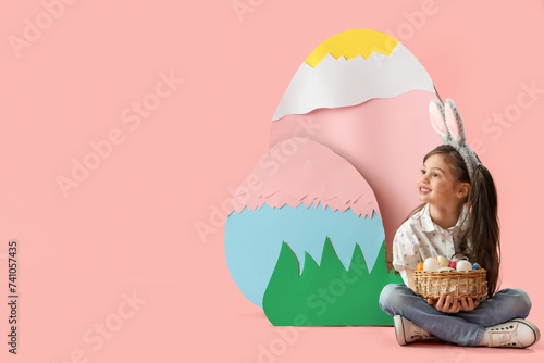 Happy young girl with bunny...