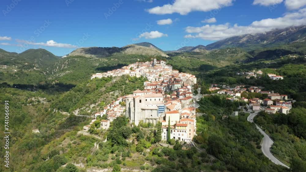 The town of Rivello in its green countryside surrounded by mountains in Europe, Italy, Basilicata, towards Potenza, in summer, on a sunny day. The town of Rivello in its green countryside surrounded by mountains in Europe, Italy, Basilicata, towards Potenza, in summer, on a sunny day.