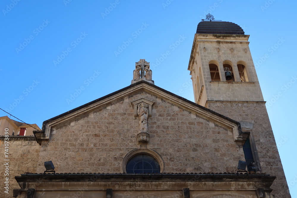 Alcoy, Alicante, Spain, February 20, 2024: Upper part of the facade of the Sanctuary of Maria Auxiliadora in Alcoy, Alicante, Spain