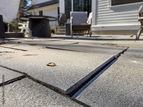 Frost heaves under the patio - Winter patio becomes uneven as pavers lift with frost heaves in freezing weather