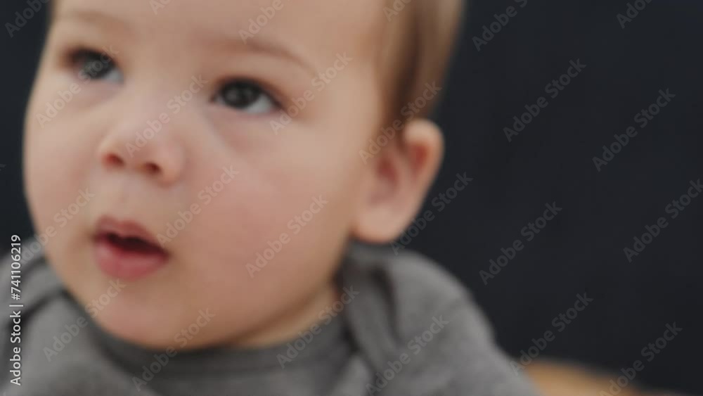 Baby boy making funny faces for the camera Baby boy making funny faces for the camera
